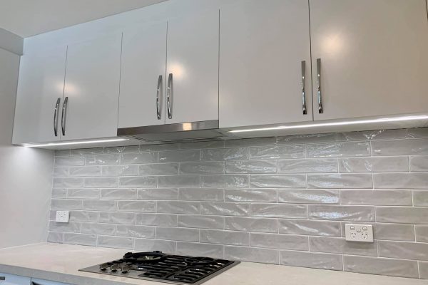 light grey kitchen with subway tiles splashback - Kitchen Showroom Displays in Castle Hill